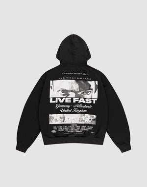The LFDY Cinema Hooded by LIVE FAST DIE YOUNG is an oversized black cotton hoodie with intense eyes and "LIVE FAST" printed on the front, plus Germany, Netherlands, United Kingdom text and a cityscape image on the back. | plain