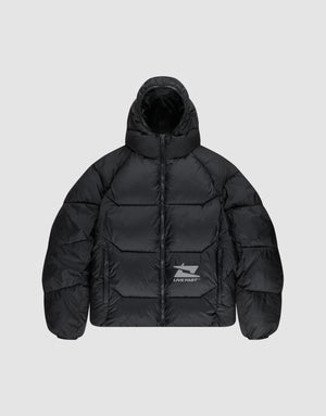 The Live Fast Puffer Jacket by LIVE FAST DIE YOUNG is a black, water-repellent jacket with a hood, front zipper, and reflective "LIVE FAST" text plus a shark graphic on the left chest. Seen here on a light gray background. | plain