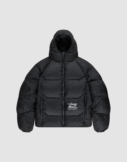 The Live Fast Puffer Jacket by LIVE FAST DIE YOUNG is a black, water-repellent jacket with a hood, front zipper, and reflective "LIVE FAST" text plus a shark graphic on the left chest. Seen here on a light gray background. | plain