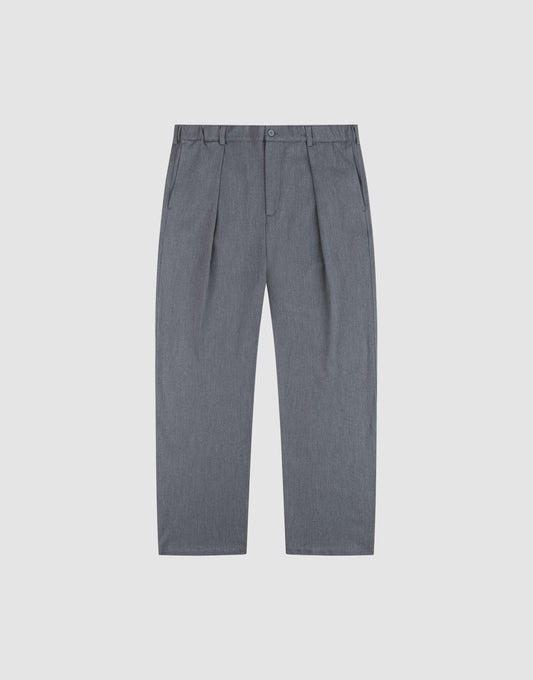 The LIVE FAST DIE YOUNG Wide Casual Pants feature a gray pleated design with a wide fit, belt loops, elastic waistband, side pockets, and button closure, shown laid flat on a plain white background. | plain