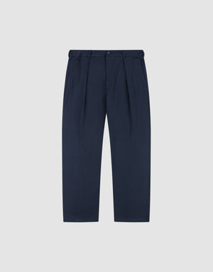 LIVE FAST DIE YOUNG Wide Casual Pants in navy blue with pleats, wide fit and straight leg, belt loops, side pockets, and button waistband, shown on a plain light grey background. | plain