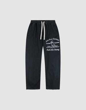 The LFDY Praying Jogger by LIVE FAST DIE YOUNG features a wide fit, white drawstrings, and bold white graphic text with a snake illustration on the left thigh. | plain