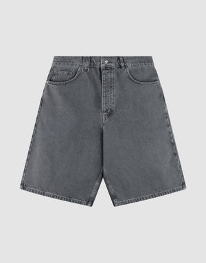 The LFDY Jorts by LIVE FAST DIE YOUNG are high-waisted, knee-length denim shorts in faded black with a wide straight leg and baggy fit, front and back pockets, belt loops, and a button-zip closure, laid on a light gray background. | plain