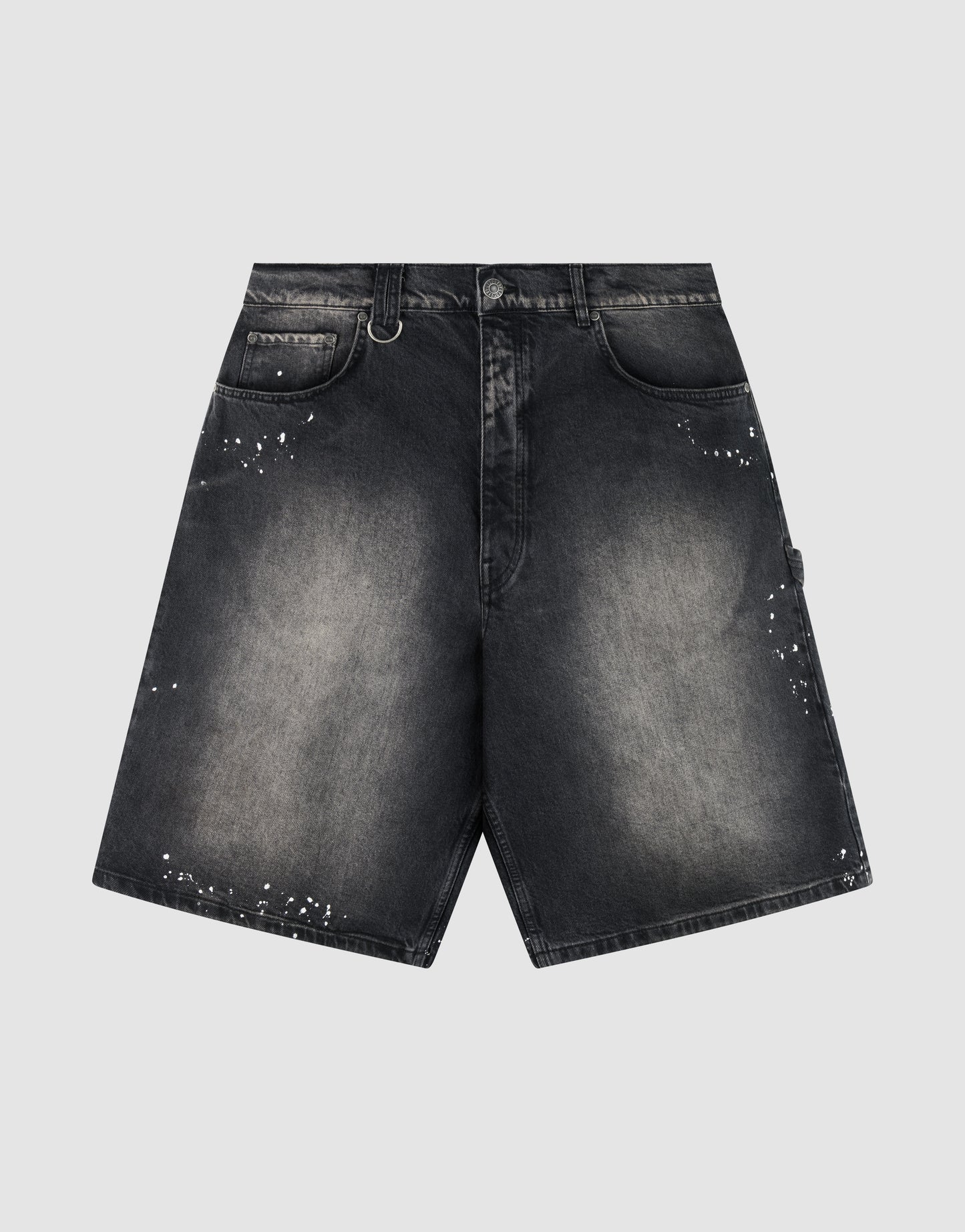 The LIVE FAST DIE YOUNG Carpenter Jorts are black denim shorts with a faded, worn look, Farbspritzer details, side and front pockets, belt loops, a waistband D-ring, and a comfy baggy fit. Shown on a plain light gray background.