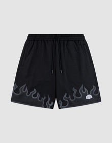 LIVE FAST DIE YOUNG Burning Mesh Shorts: black athletic shorts with elastic waistband, drawstring, gray flame print along the bottom, and a small white rectangular patch on the left leg. Plain light gray background. | plain