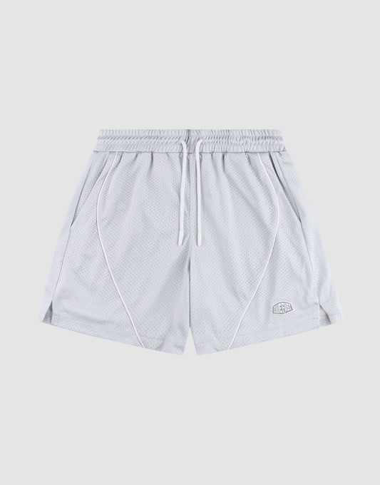 The LFDY Piping Mesh Shorts by LIVE FAST DIE YOUNG feature light gray polyester mesh, an elastic waistband with white drawstring, side pockets, front seam piping, a logo patch on the lower left leg, and a regular fit. Background is plain light gray. | plain