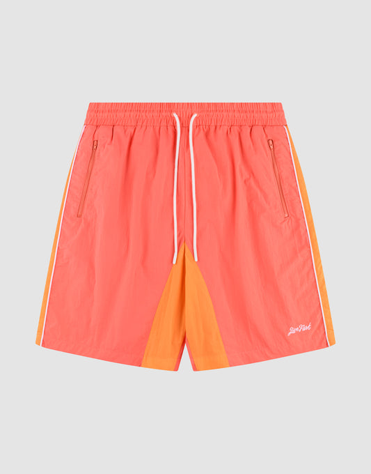 LIVE FAST DIE YOUNG Beach Shorts in coral pink feature an elastic waistband, white drawstring, orange side and center panels, white piping, zippered side pockets, and a small white logo on the left leg. Regular fit for all-day comfort. | plain