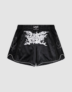 LFDY Fighting Shorts by LIVE FAST DIE YOUNG feature black polyester fabric, silver flame patterns on the sides, a bold white front graphic, breiter Elastikbund, and seitliche Eingrifftaschen for extra function. | plain