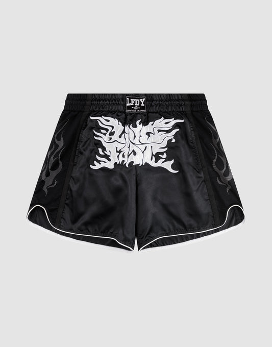 LFDY Fighting Shorts by LIVE FAST DIE YOUNG feature black polyester fabric, silver flame patterns on the sides, a bold white front graphic, breiter Elastikbund, and seitliche Eingrifftaschen for extra function. | plain