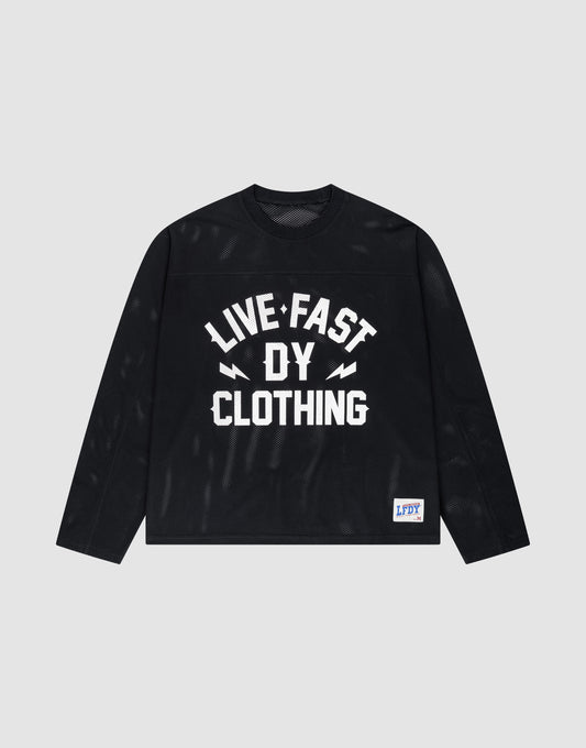 The LFDY Flash Jersey by LIVE FAST DIE YOUNG is a black long-sleeve, oversize fit shirt with a bold white "LIVE FAST DY CLOTHING" front print and a small blue-and-white LFDY patch near the hem, shown on a plain background. | plain
