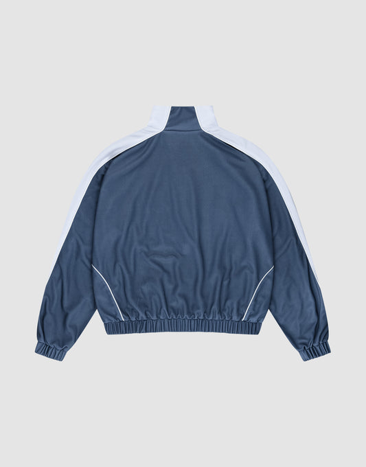 The LIVE FAST DIE YOUNG LFDY Arch Trackjacket in blue polyester features white stripes on the shoulders and sleeves, an oversize fit, and elastic cuffs and hem, shown laid flat from the back on a light gray background.