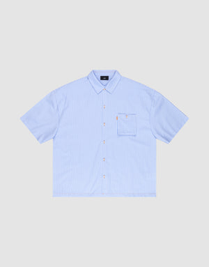 The LFDY Striped Boxy Shirt by LIVE FAST DIE YOUNG is a light blue and white short-sleeve button-up with thin vertical stripes, a chest pocket, and subtle Logo-Stick detail, shown on a plain light gray background. | plain