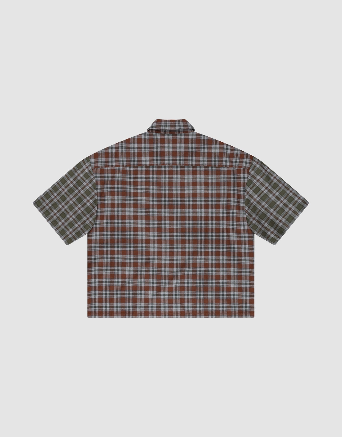 The LFDY Light Flannel by LIVE FAST DIE YOUNG is a short-sleeved, oversized button-up with mixed red/blue and green plaid panels, vintage washed look, and made from 100% cotton. Shown laid flat on a light background.