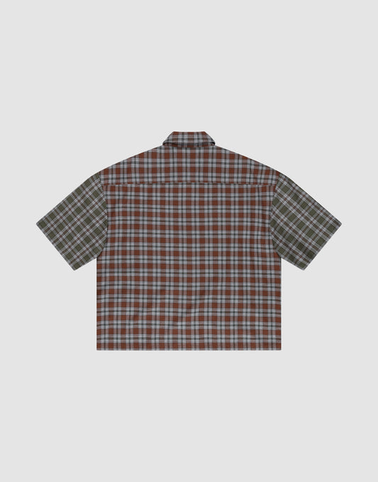 The LFDY Light Flannel by LIVE FAST DIE YOUNG is a short-sleeved, oversized button-up with mixed red/blue and green plaid panels, vintage washed look, and made from 100% cotton. Shown laid flat on a light background.