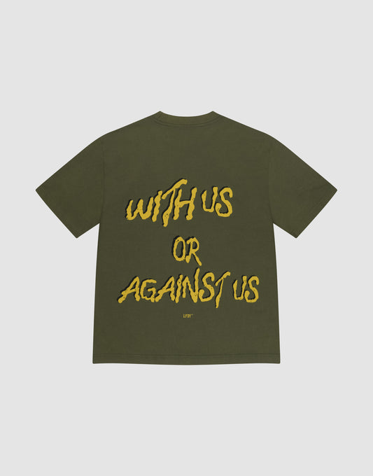 The LFDY Against us Tee by LIVE FAST DIE YOUNG is an olive green oversized T-shirt made from 100% cotton, with a bold yellow “WITH US OR AGAINST US” handwritten-style back print and the LFYT logo below in smaller yellow letters. | plain