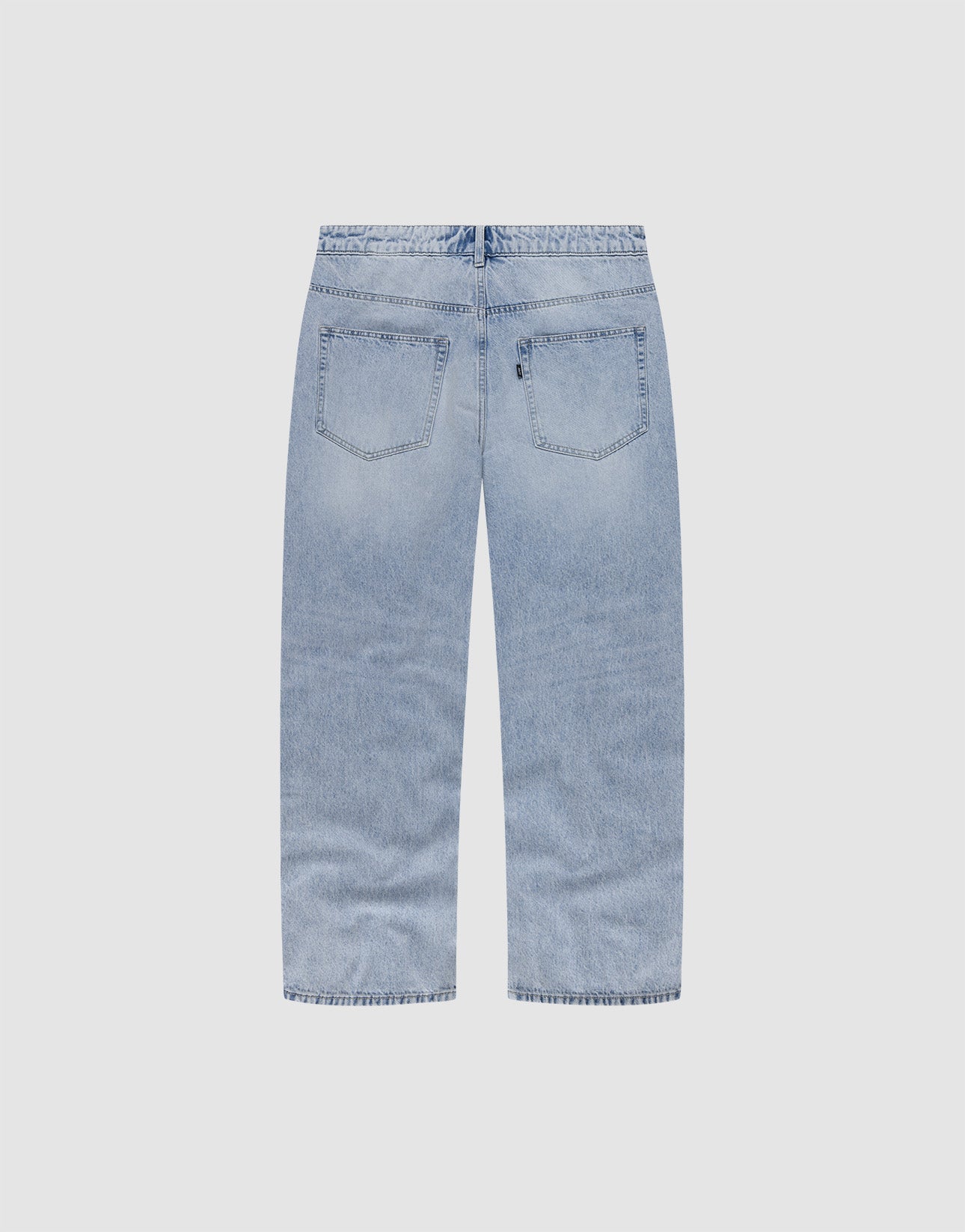 Back view of LFDY Baggy Denim by LIVE FAST DIE YOUNG in light blue, featuring baggy fit, wide straight legs, two back pockets, and subtle fading on a plain white background. Made from 100% Baumwolle.