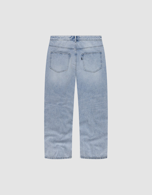 Back view of LFDY Baggy Denim by LIVE FAST DIE YOUNG in light blue, featuring baggy fit, wide straight legs, two back pockets, and subtle fading on a plain white background. Made from 100% Baumwolle.