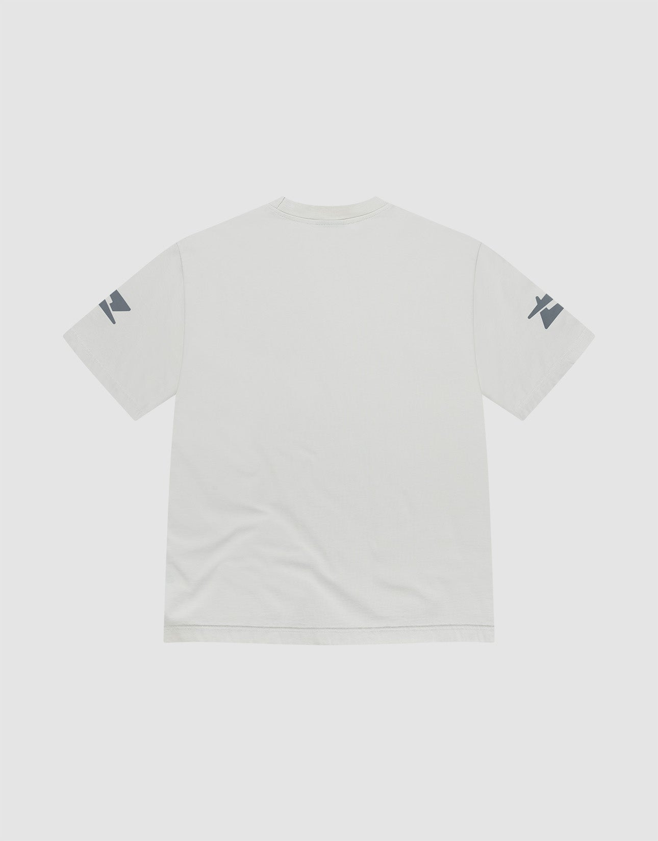 The LFDY Window Tee by LIVE FAST DIE YOUNG is a plain white oversize short-sleeve T-shirt, shown from the back, with small reflective prints on each sleeve near the shoulder. Made from 100% cotton for comfort and style.