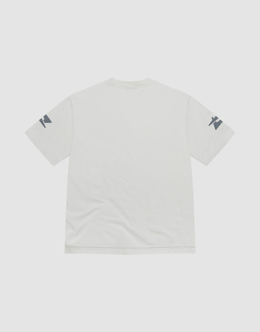 The LFDY Window Tee by LIVE FAST DIE YOUNG is a plain white oversize short-sleeve T-shirt, shown from the back, with small reflective prints on each sleeve near the shoulder. Made from 100% cotton for comfort and style.