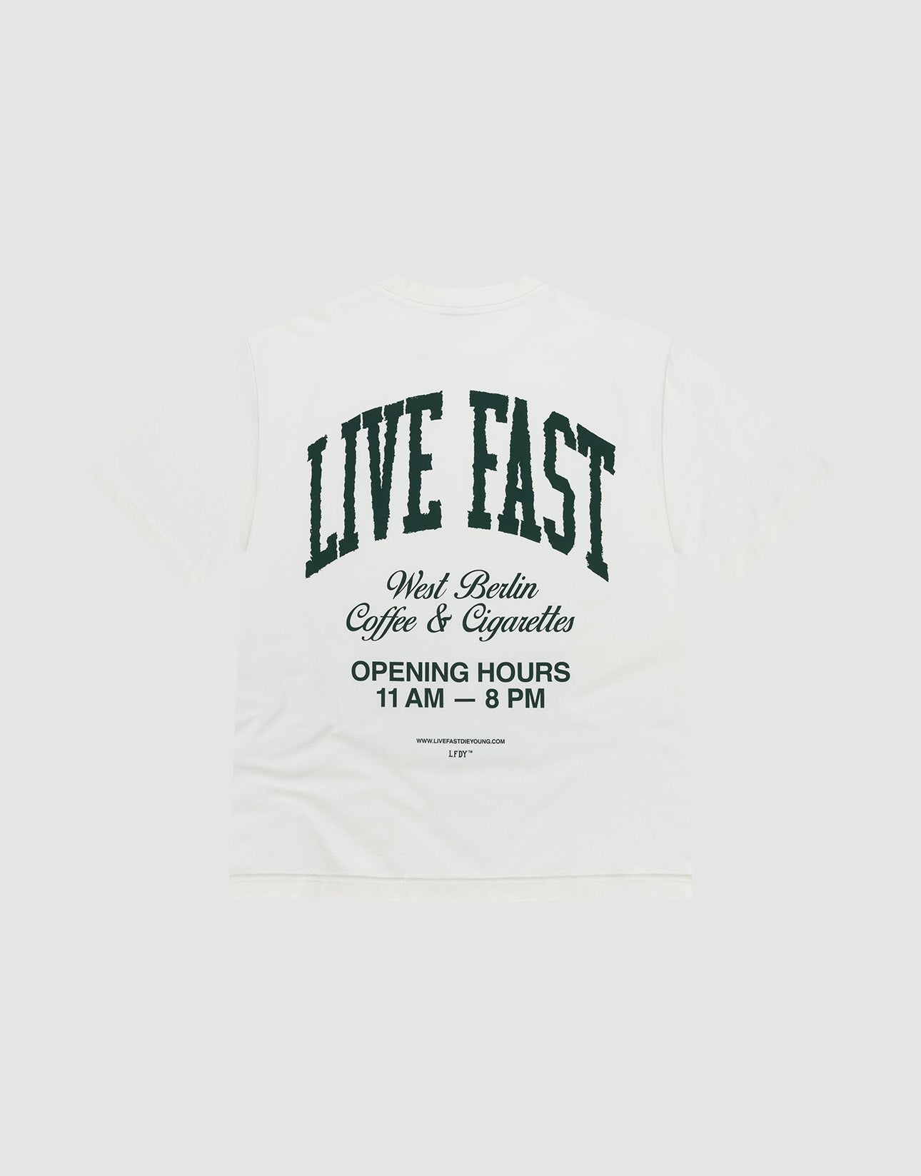 The Live Fast Coffee Tee by LIVE FAST DIE YOUNG is a white oversized T-shirt made from 100% Baumwolle, featuring bold front and back prints. Large black text on the back reads "LIVE FAST" with West Berlin Coffee & Cigarettes and opening hours below.