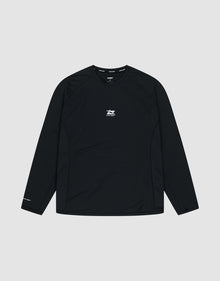 The LIVE FAST DIE YOUNG Live Fast Performance Longsleeve is a black slim-fit athletic shirt featuring a small white logo and text on the chest, plus more white text on the left sleeve and a reflective front print, shown on a plain light gray background. | plain