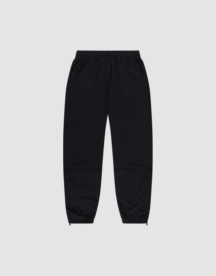 LIVE FAST DIE YOUNG's Live Fast Performance Running Pants feature an oversized fit, elastic waistband, and cuffed ankles, shown on a plain light gray background.