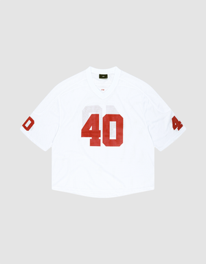 The LFDY Mesh Jersey by LIVE FAST DIE YOUNG is a white polyester football jersey with an oversize fit, short sleeves, and bold red number 40 on the front and sleeves. It features a V-neck collar and is shown on a light gray background. | plain