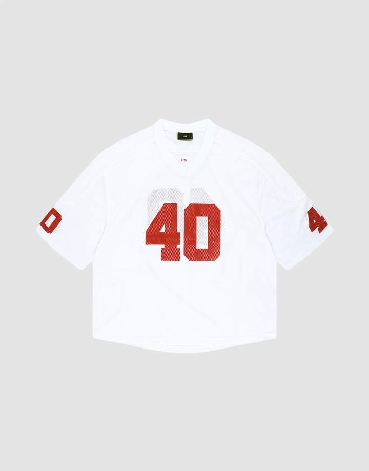The LFDY Mesh Jersey by LIVE FAST DIE YOUNG is a white polyester football jersey with an oversize fit, short sleeves, and bold red number 40 on the front and sleeves. It features a V-neck collar and is shown on a light gray background. | plain
