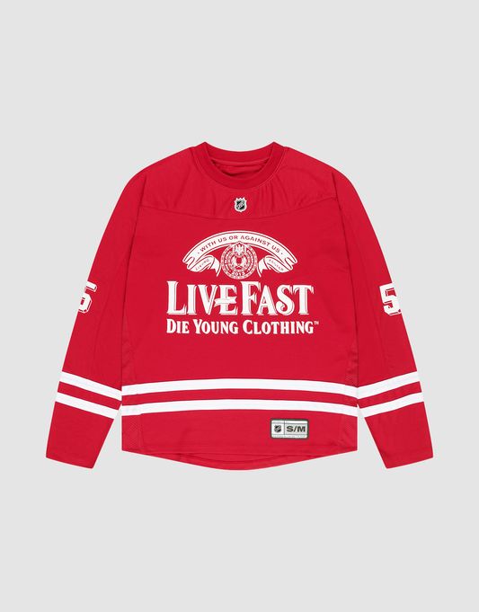 The LFDY Hockey Jersey by LIVE FAST DIE YOUNG is a red, oversized polyester long-sleeve shirt with white stripes, "LIVE FAST DIE YOUNG CLOTHING" on the front, number 56 on the sleeves, and an NHL-style collar patch. | plain