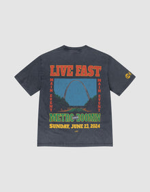 The LFDY Metro Boomin Tee by LIVE FAST DIE YOUNG is a dark gray oversize fit shirt made of 100% cotton, featuring colorful front and back prints with event details and a Gateway Arch illustration.| plain