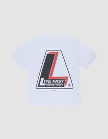 The LFDY Industries Tee by LIVE FAST DIE YOUNG is an oversize white T-shirt featuring a large triangular back logo with a bold red and black "L" and "LIVE FAST INDUSTRIES" printed below in white font. | plain