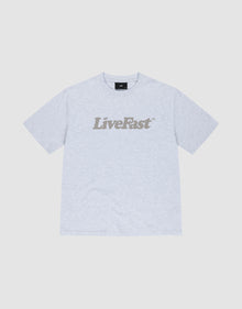 The Basic Tee by LIVE FAST DIE YOUNG is a light gray oversized cotton t-shirt with "Live Fast" boldly printed in dark gray across the chest, shown against a white background. | plain