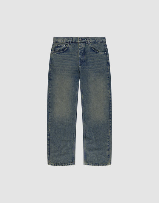 The LIVE FAST DIE YOUNG Regular Denim jeans feature a classic five-pocket style, blue shade with slight thigh fading, and button-zip closure, shown against a plain light background. | plain