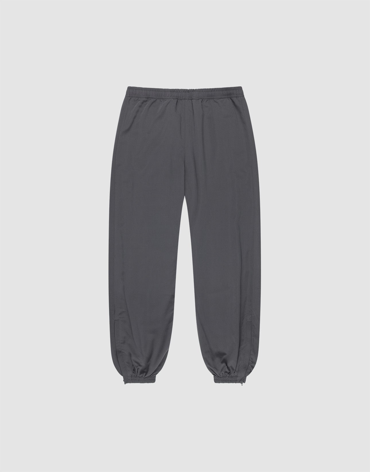 The LFDY Trackpants by LIVE FAST DIE YOUNG are gray, regular-fit joggers with an elastic waistband and ankle cuffs, made from soft polyester and displayed flat on a plain white background.