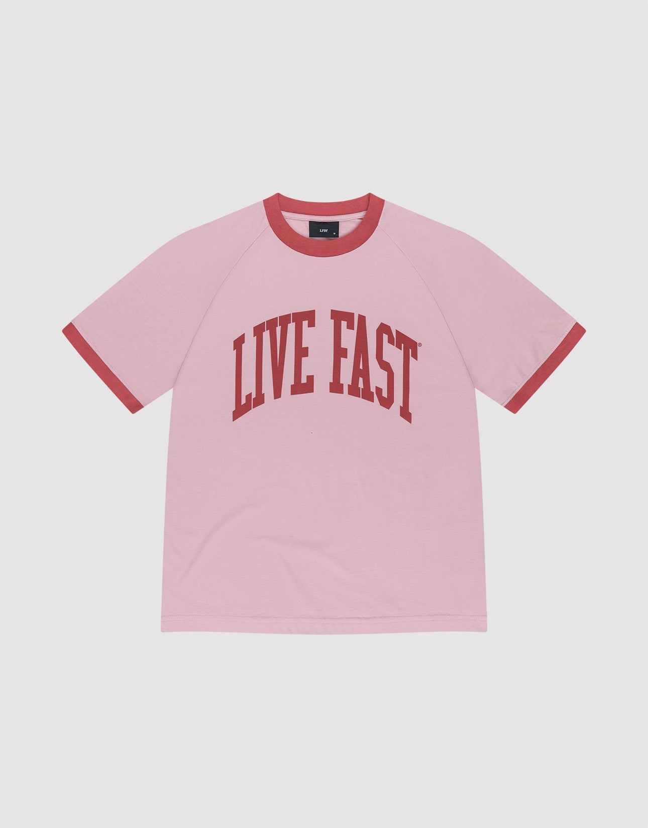 The Live Fast Contrast Tee by LIVE FAST DIE YOUNG is a pink regular fit short-sleeve t-shirt with red trim on the collar and sleeves, featuring a bold LIVE FAST print across the chest. | plain