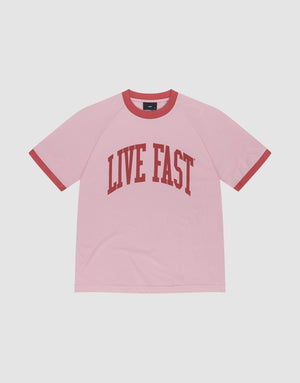 The Live Fast Contrast Tee by LIVE FAST DIE YOUNG is a pink regular fit short-sleeve t-shirt with red trim on the collar and sleeves, featuring a bold LIVE FAST print across the chest. | plain