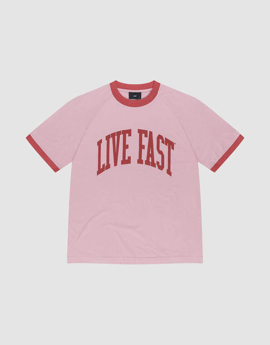 The Live Fast Contrast Tee by LIVE FAST DIE YOUNG is a pink regular fit short-sleeve t-shirt with red trim on the collar and sleeves, featuring a bold LIVE FAST print across the chest. | plain