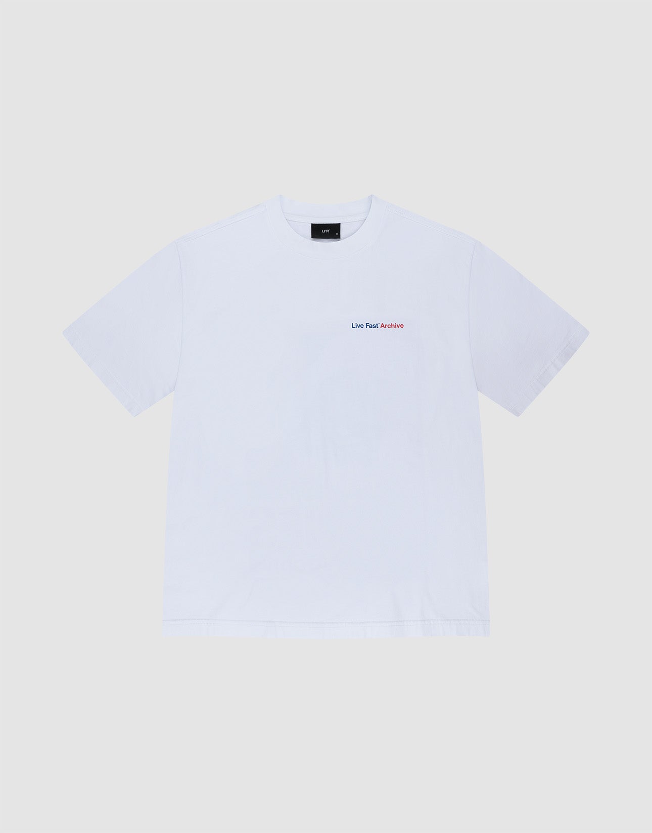 The LFDY F*ck Phones Tee by LIVE FAST DIE YOUNG is a plain white oversized cotton t-shirt with small red "Live Fast Archive" embroidery on the left chest, shown laid flat on a light gray background.