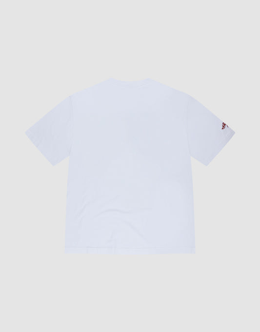 The LIVE FAST DIE YOUNG Live Fast Stallion Tee, a plain white oversize short-sleeve t-shirt made of 100% Baumwolle, is shown from the back on a light gray background with a small red embroidered detail on the left sleeve.