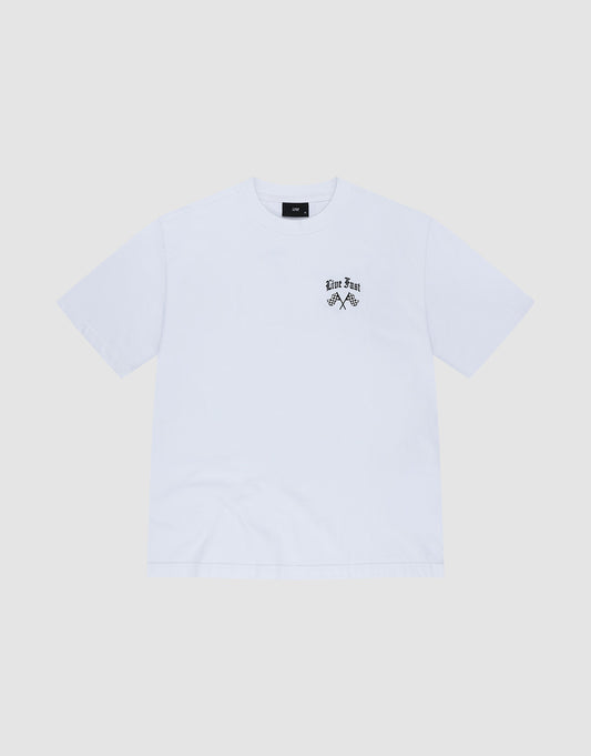 The LFDY Haters Tee by LIVE FAST DIE YOUNG is a plain white short-sleeve shirt with a small black graphic and "Live Fast" text on the left chest, made from 100% Baumwolle, shown on a light gray background.