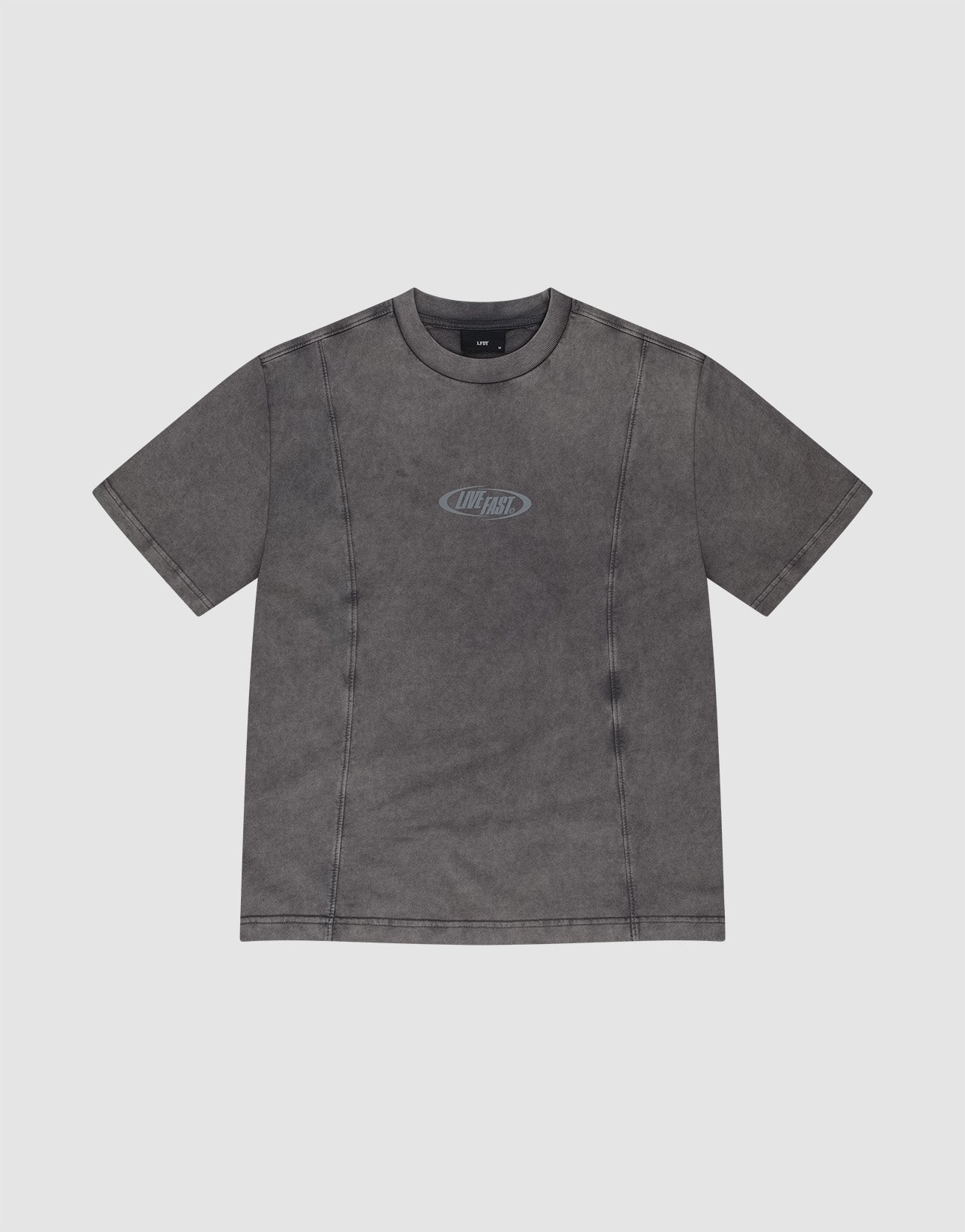 The Live Fast Wave Tee by LIVE FAST DIE YOUNG is a short-sleeve washed black t-shirt in Vintage Waschung, featuring visible stitching and a subtle oval LAST LAST logo as a reflective front print. The shirt is shown laid flat on a white background.