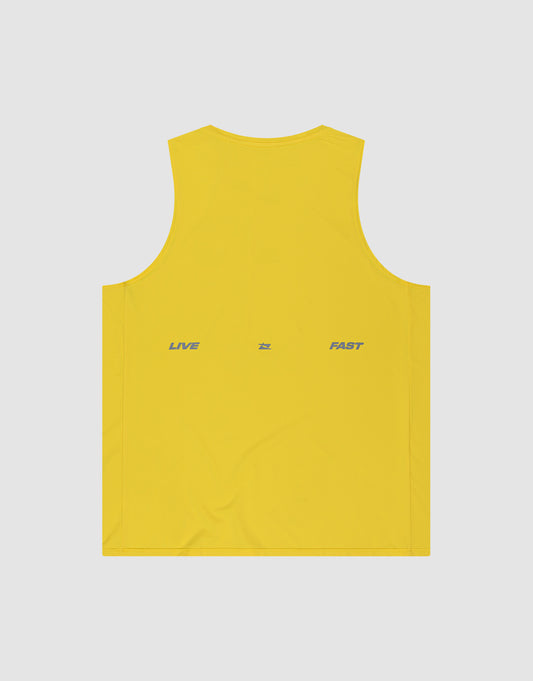 The LIVE FAST DIE YOUNG Live Fast Performance Tank is a yellow sleeveless slim fit top in nylon spandex, featuring "LIVE" and "FAST" printed in gray on the back with a small gray symbol, set against a light gray background.