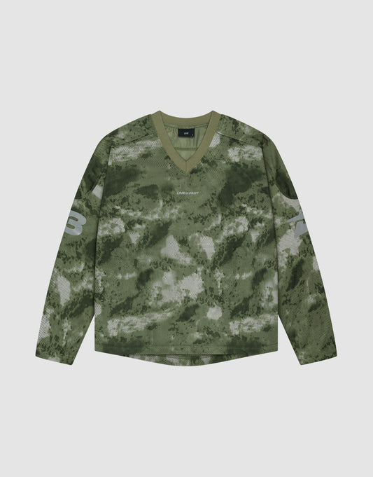 The LIVE FAST DIE YOUNG Camo Mesh Jersey is an oversized, long-sleeve V-neck shirt in green camo, with the number 3 on each sleeve and a small reflective LIVE FAST print on the chest. It is shown laid flat on a light background. | plain