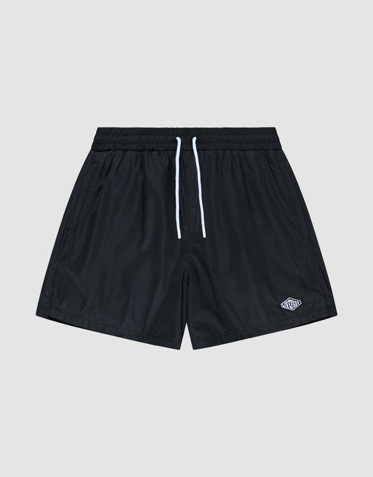 The Basic Satin Shorts by LIVE FAST DIE YOUNG are black polyester athletic shorts with an elastic waistband, white drawstrings, and a small white logo on the lower left leg, shown against a plain light gray background. | plain