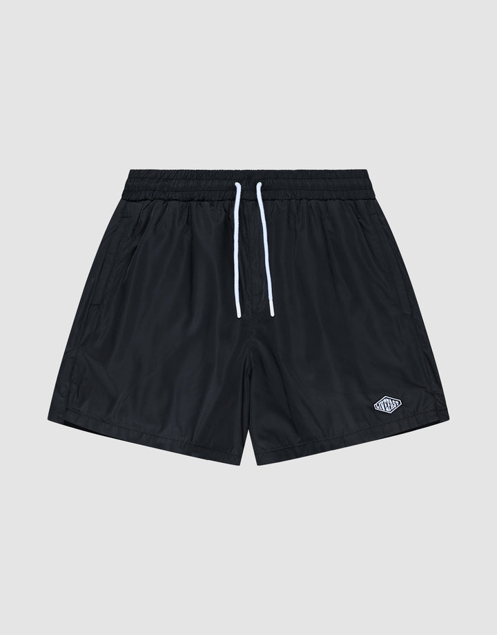 The Basic Satin Shorts by LIVE FAST DIE YOUNG are black polyester athletic shorts with an elastic waistband, white drawstrings, and a small white logo on the lower left leg, shown against a plain light gray background. | plain