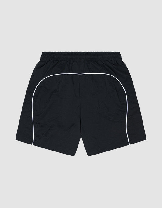LIVE FAST DIE YOUNG Beach Shorts—black athletic swimwear with an elastic waistband and white curved piping along the sides and back in a Regular Fit, shown on a plain light gray background.