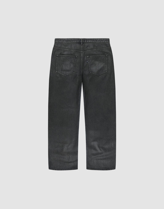 The LFDY Coated Baggy Denim by LIVE FAST DIE YOUNG is shown from the back, featuring two rear pockets and visible stitching, crafted from 100% Baumwolle with a wide straight-leg design against a plain light background.
