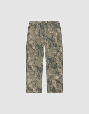 The Live Fast Canvas Pants by LIVE FAST DIE YOUNG are baggy-fit, wide-leg pants in green and beige camo, made from 100% Baumwolle with a button and zip closure, belt loops, and front pockets, shown on a plain white background. | plain