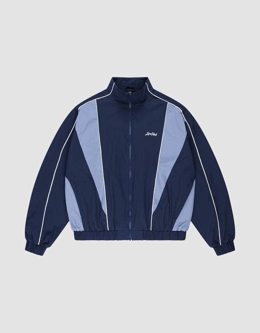 The LIVE FAST DIE YOUNG Basic Nylon Trackjacket in navy and light blue features white piping, a full front zipper, high collar, and elastic cuffs and waistband, shown flat on a light gray background. | plain