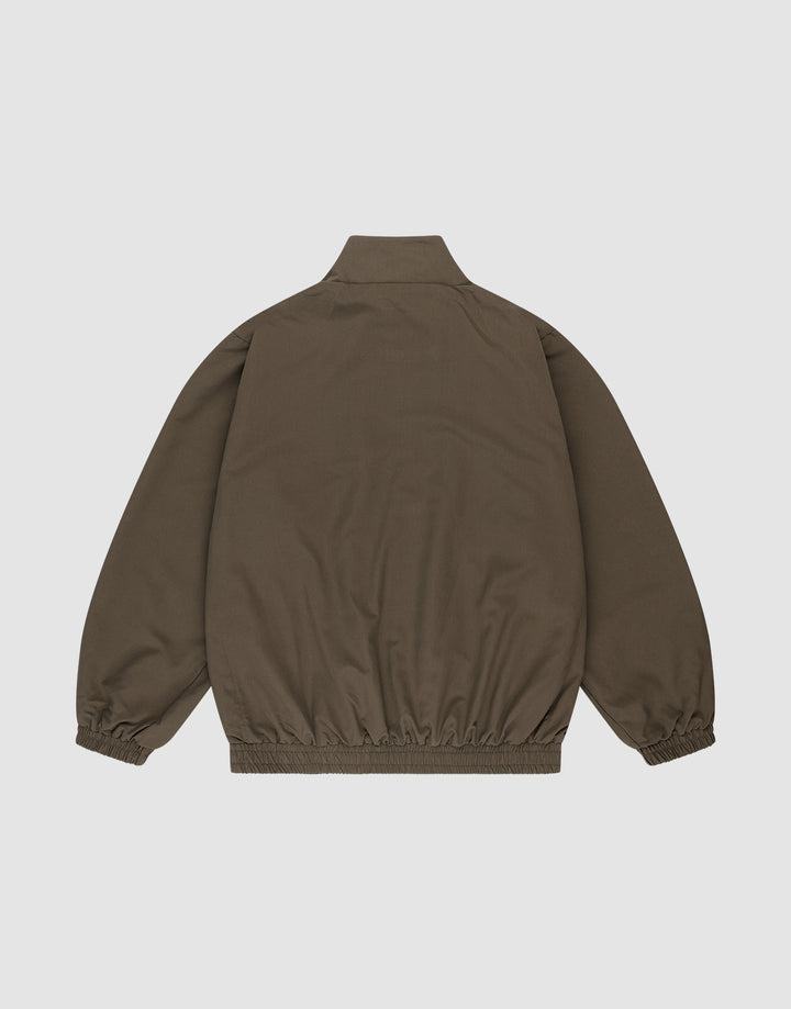 The LFDY Trackjacket by LIVE FAST DIE YOUNG is shown from the back in brown. It features a stand-up collar, elastic cuffs and hem, a simple unadorned design, and an Oversize Fit for comfort.